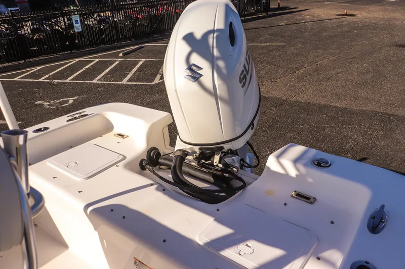 Slide: The Image of Savannah SS21 2022 boat with Suzuki outboard motor in parking lot. - 13