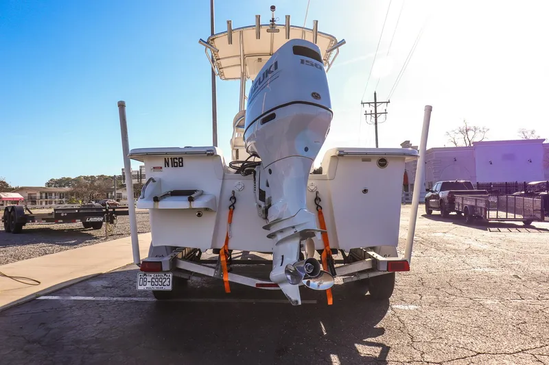 Slide: The Image of Rear view of a 2022 Savannah SS21 boat on a trailer in a parking lot. - 3