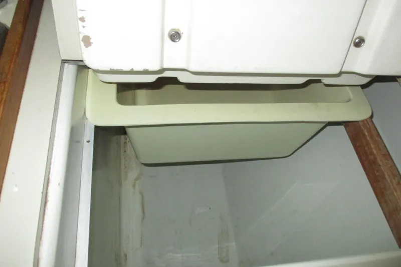 Slide: The Image of Interior storage compartment of a 1981 C & C 32 sailboat. - 20