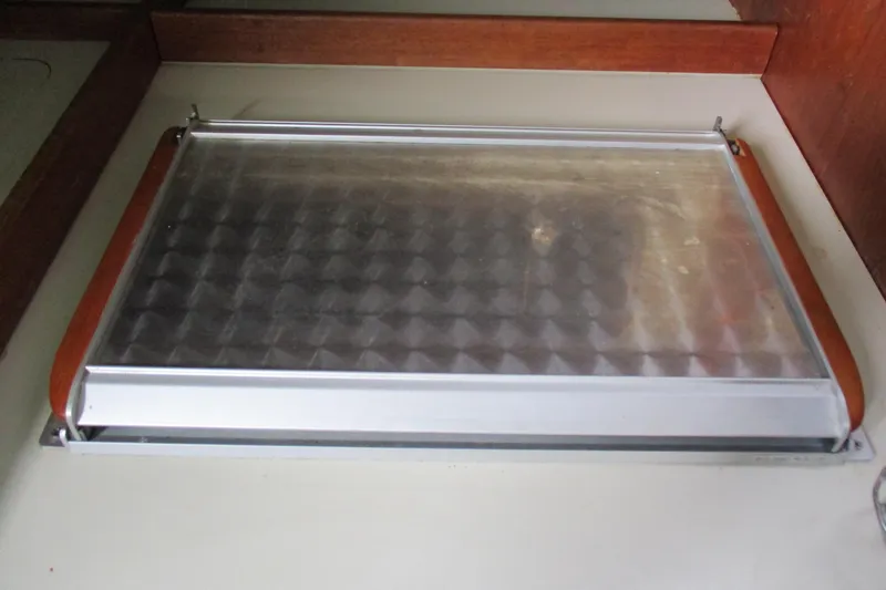 Slide: The Image of Aluminum hatch cover on a 1981 C & C 32 sailboat interior. - 22