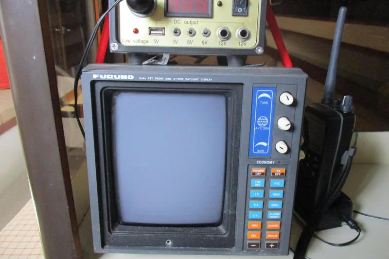Slide: The Image of Vintage Furuno radar display and DC power supply on a 1981 C & C 32 sailboat. - 32