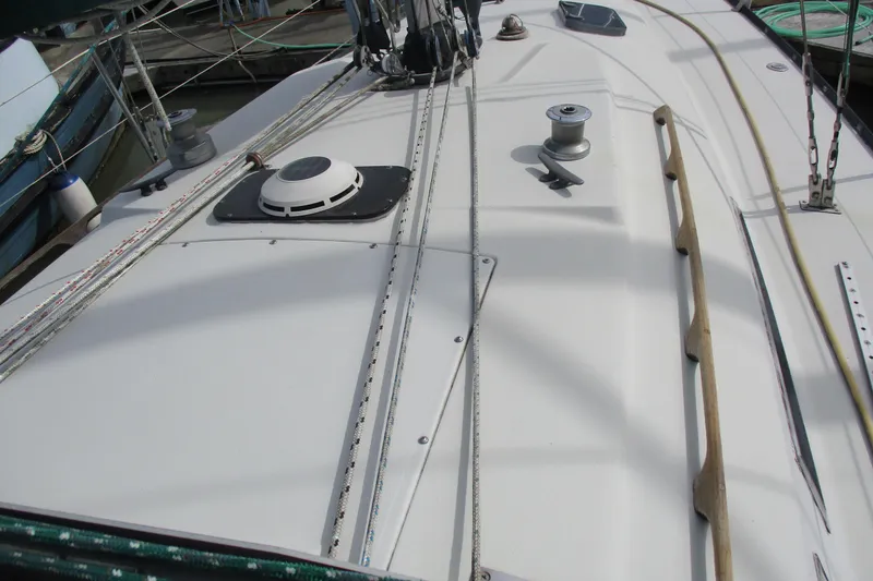 Slide: The Image of Deck view of a 1981 C & C 32 sailboat, featuring winches and rigging. - 4