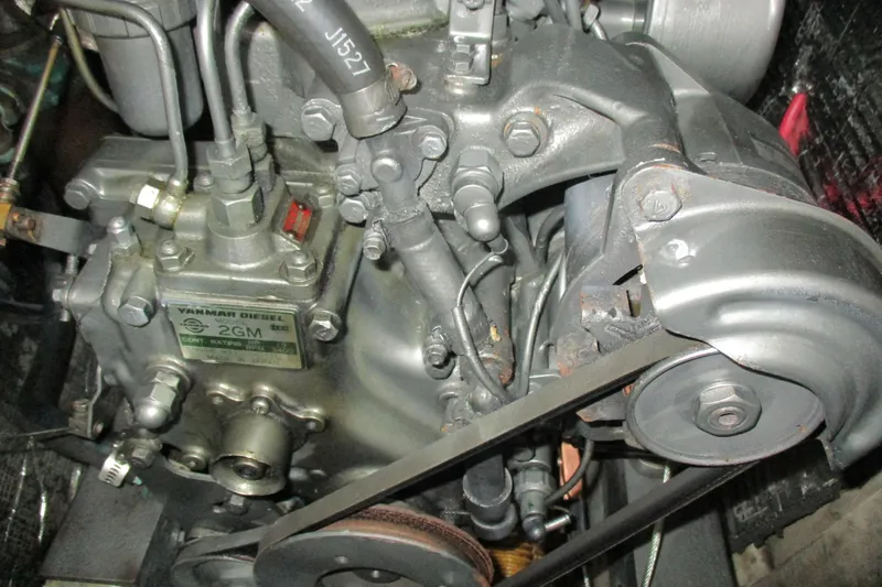 Slide: The Image of Engine of a 1981 C & C 32 sailboat, featuring a Yanmar Diesel 2GM. - 44