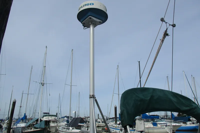 Slide: The Image of Marina with sailboats and radar equipment on a 1981 C & C 32 yacht. - 9
