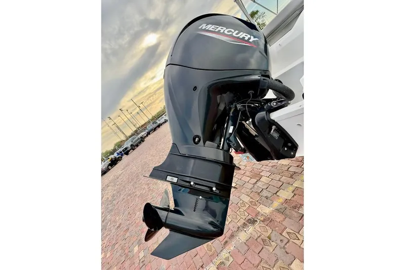 Slide: The Image of 2020 Sea Ray SPX 210 Outboard with Mercury engine on brick pavement. - 11