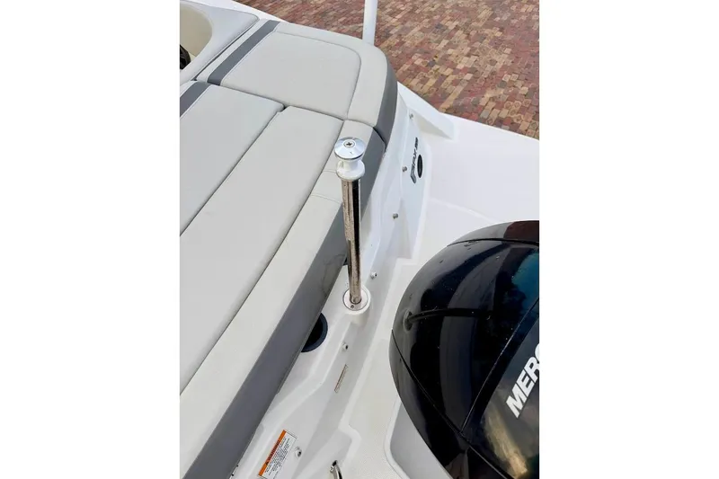 Slide: The Image of 2020 Sea Ray SPX 210 Outboard boat interior with Mercury engine detail. - 15