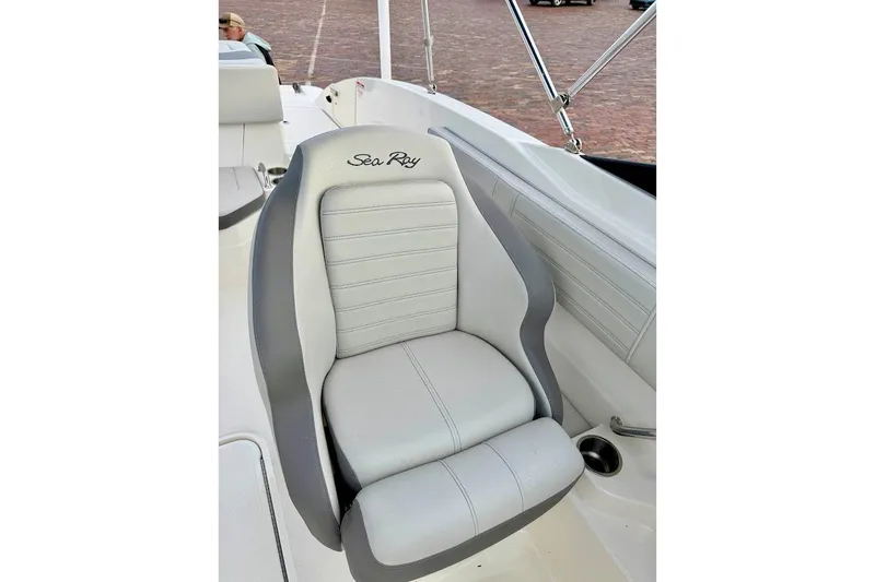 Slide: The Image of 2020 Sea Ray SPX 210 Outboard boat seat with gray and white upholstery. - 26