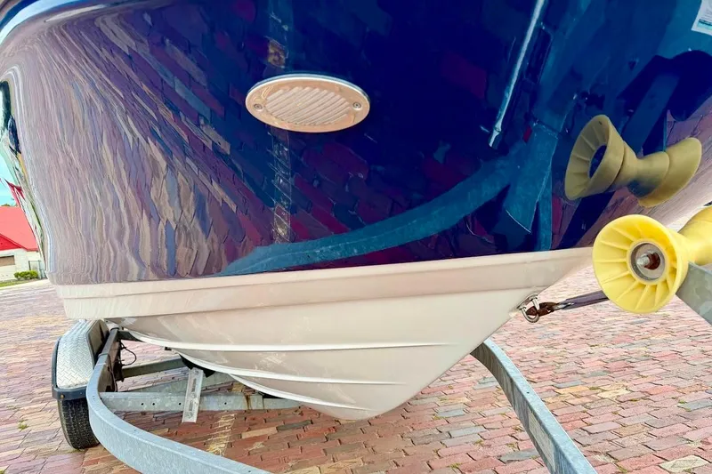 Slide: The Image of 2020 Sea Ray SPX 210 Outboard boat on trailer, brick pavement background. - 8