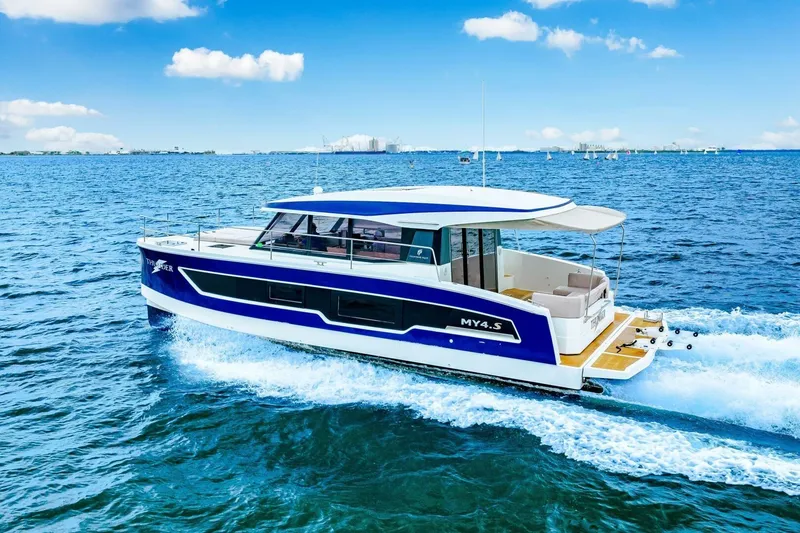 Slide: The Image of 2021 Fountaine Pajot MY4.S yacht cruising on open blue sea under clear sky. - 103