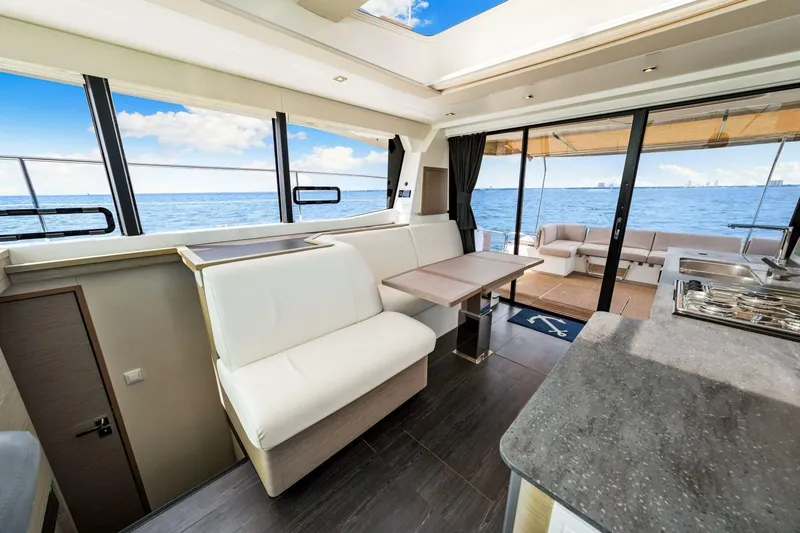 Slide: The Image of Luxurious interior of 2021 Fountaine Pajot MY4.S yacht with ocean view. - 18