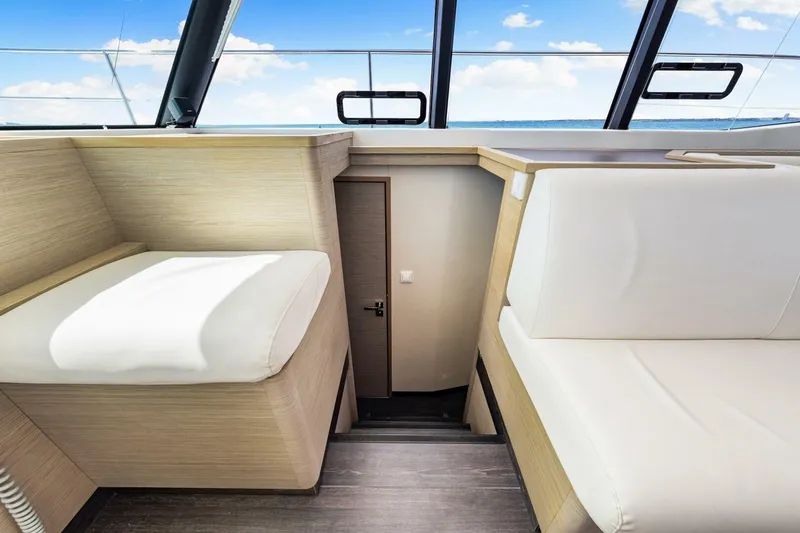 Slide: The Image of Interior of 2021 Fountaine Pajot MY4.S yacht with modern seating and ocean view. - 19