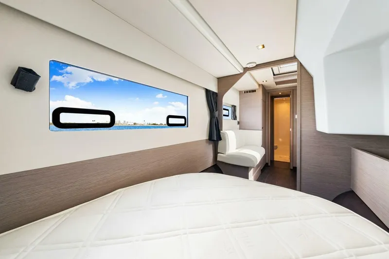 Slide: The Image of Luxurious interior of 2021 Fountaine Pajot MY4.S yacht with scenic window view. - 28