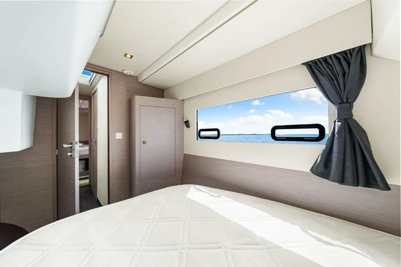 Slide: The Image of Luxurious cabin interior of 2021 Fountaine Pajot MY4.S yacht with ocean view. - 29