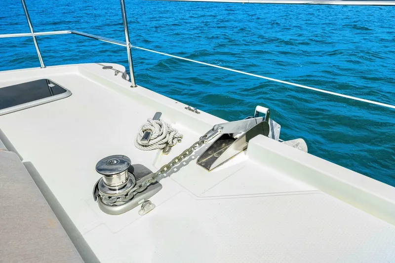 Slide: The Image of Anchor system on 2021 Fountaine Pajot MY4.S yacht, with ocean backdrop. - 37