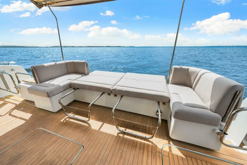 Slide: The Image of Luxury seating area on 2021 Fountaine Pajot MY4.S yacht with ocean view. - 44