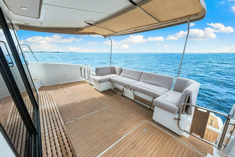 Slide: The Image of Luxurious 2021 Fountaine Pajot MY4.S yacht deck with ocean view and comfortable seating. - 45