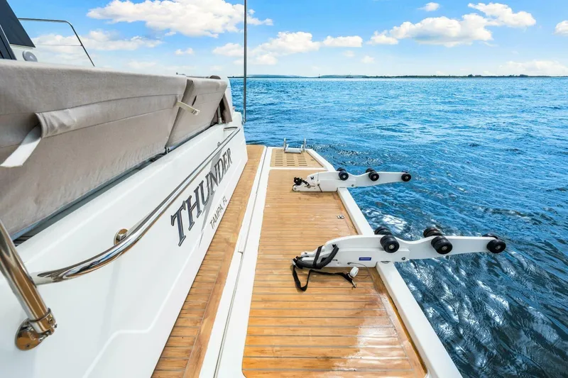Slide: The Image of 2021 Fountaine Pajot MY4.S yacht deck with ocean view, featuring "Thunder" from Tampa, FL. - 52