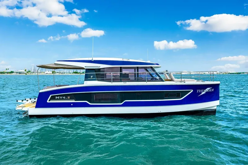 Slide: The Image of 2021 Fountaine Pajot MY4.S yacht on blue ocean under clear sky. - 56