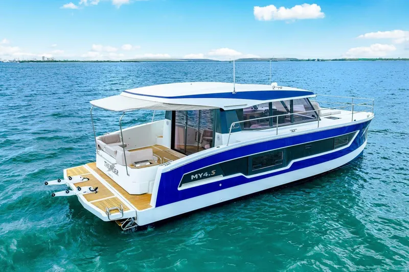 Slide: The Image of 2021 Fountaine Pajot MY4.S yacht on open water, showcasing sleek design and luxury features. - 59
