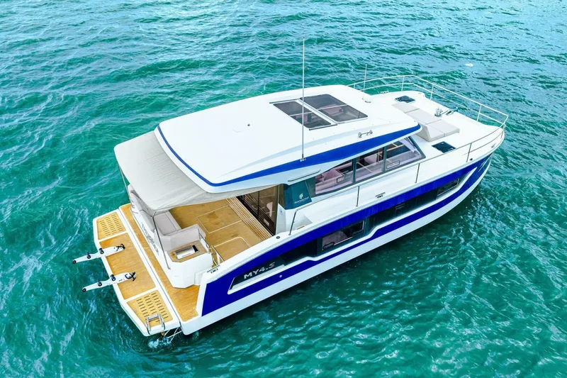 Slide: The Image of 2021 Fountaine Pajot MY4.S yacht on clear blue water, aerial view. - 60