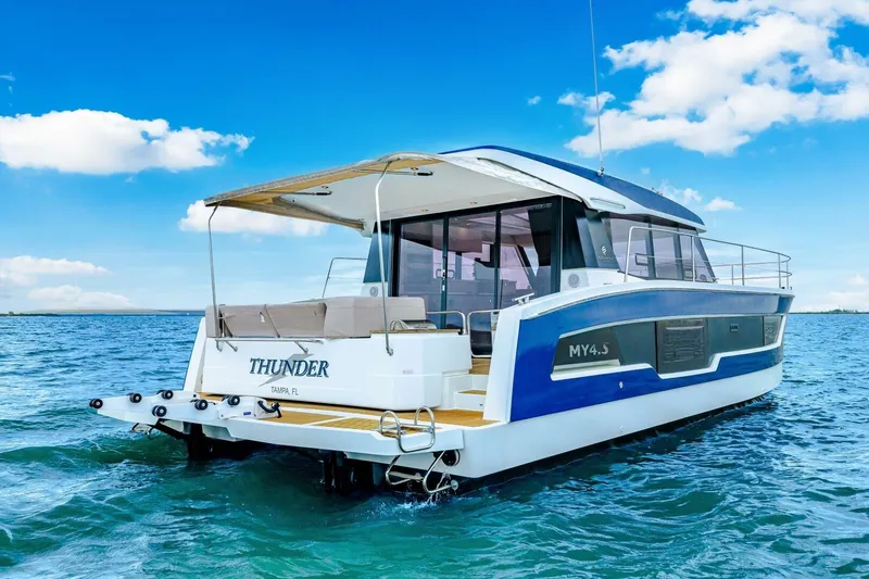 Slide: The Image of 2021 Fountaine Pajot MY4.S yacht on blue ocean under clear sky. - 62