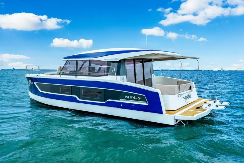 Slide: The Image of 2021 Fountaine Pajot MY4.S yacht on blue ocean under clear sky. - 63