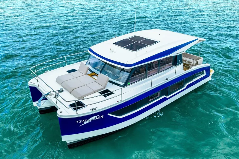 Slide: The Image of 2021 Fountaine Pajot MY4.S catamaran on blue ocean water. - 66