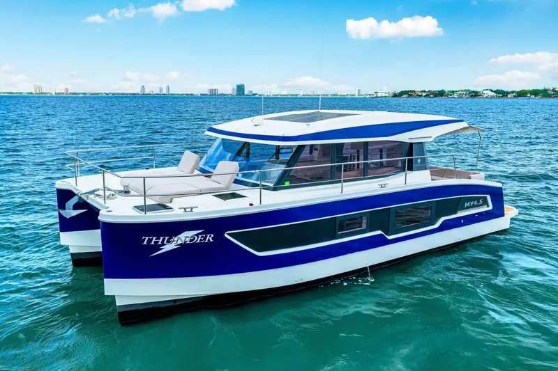 Slide: The Image of 2021 Fountaine Pajot MY4.S catamaran on blue ocean, clear sky background. - 67