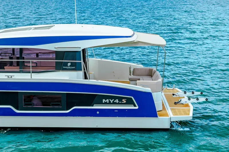Slide: The Image of 2021 Fountaine Pajot MY4.S yacht on blue ocean water, showcasing sleek design. - 73