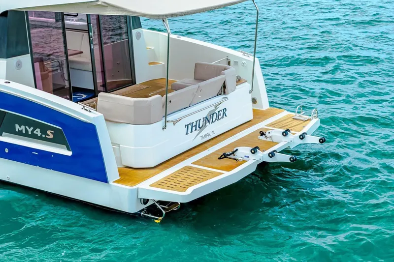 Slide: The Image of 2021 Fountaine Pajot MY4.S yacht on water, featuring spacious deck and seating. - 74
