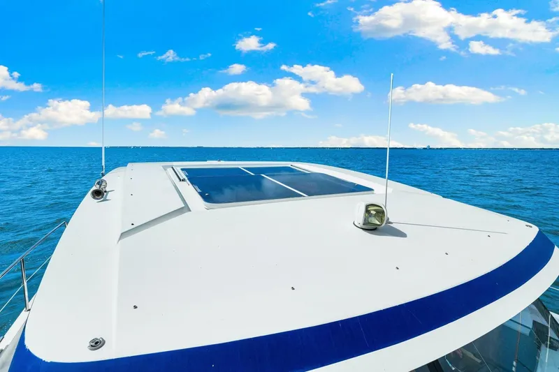Slide: The Image of 2021 Fountaine Pajot MY4.S yacht on open sea under blue sky. - 76
