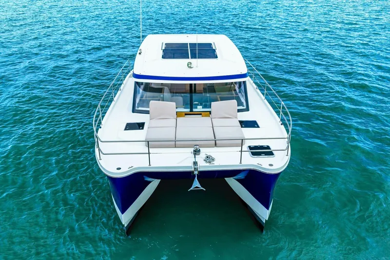 Slide: The Image of 2021 Fountaine Pajot MY4.S catamaran on blue ocean water, aerial view. - 78