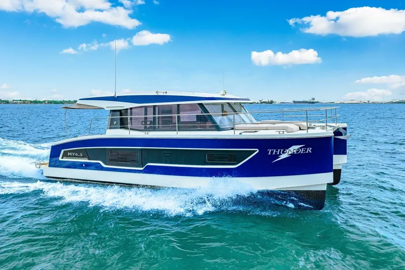 Slide: The Image of 2021 Fountaine Pajot MY4.S yacht cruising on blue ocean waters. - 82