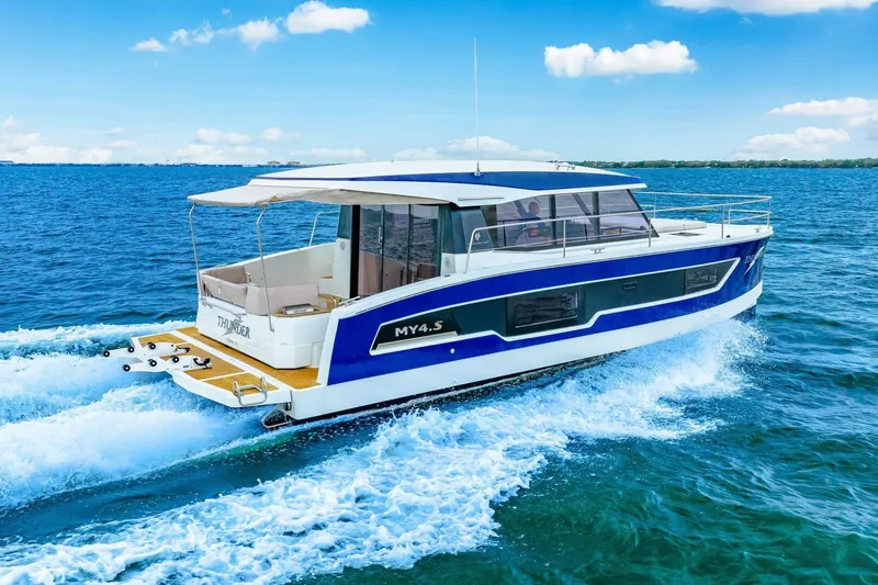 Slide: The Image of 2021 Fountaine Pajot MY4.S yacht cruising on open blue sea. - 83