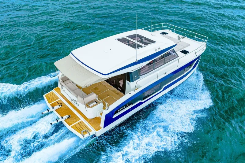 Slide: The Image of 2021 Fountaine Pajot MY4.S yacht cruising on open water. - 84
