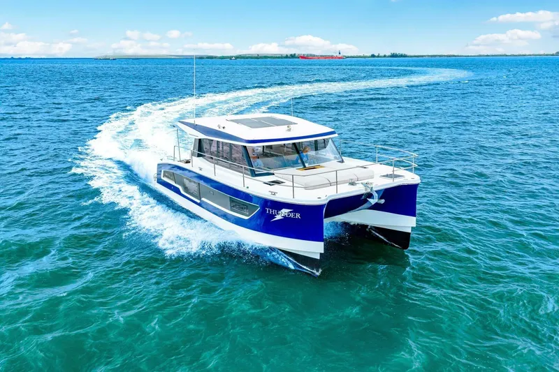Slide: The Image of 2021 Fountaine Pajot MY4.S catamaran cruising on open blue water. - 87