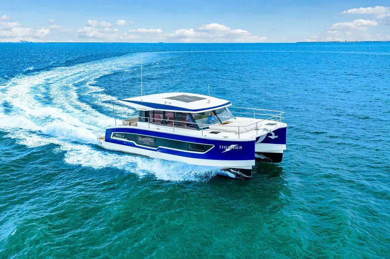 Slide: The Image of Fountaine Pajot MY4.S 2021 cruising on open blue sea under clear sky. - 88