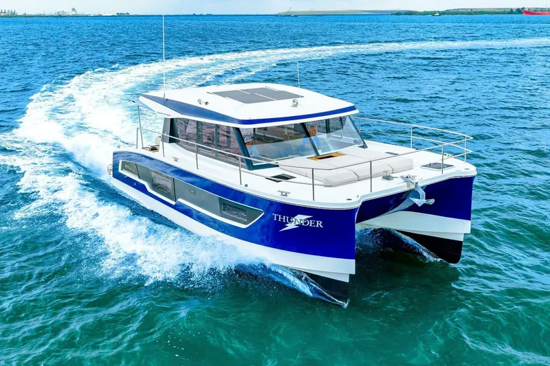 Slide: The Image of 2021 Fountaine Pajot MY4.S catamaran cruising on open blue waters. - 94