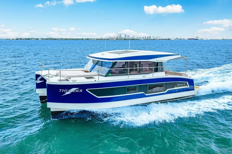 Slide: The Image of 2021 Fountaine Pajot MY4.S catamaran cruising on blue ocean waters. - 99