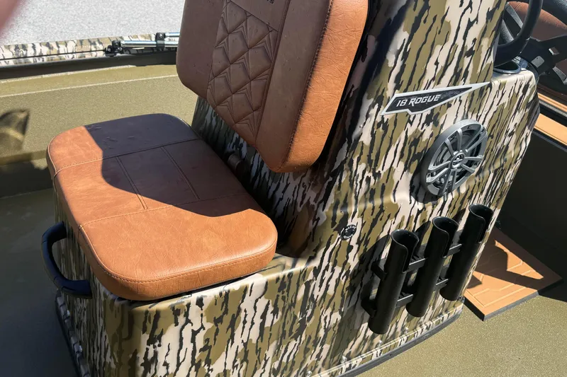 Slide: The Image of Camouflage-patterned Avid 18 Rogue CC boat seat with brown leather cushion, 2026 model. - 10