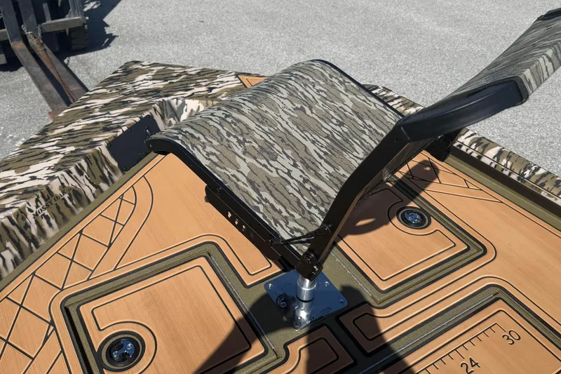 Slide: The Image of Camouflage seat on 2026 Avid 18 Rogue CC boat with detailed deck design. - 16