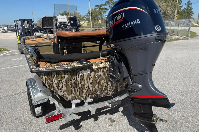 Slide: The Image of Avid 18 Rogue CC 2026 boat with Yamaha outboard motor on trailer. - 5