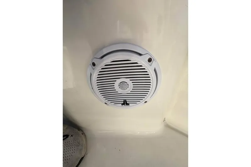 Slide: The Image of White speaker installed on a 2016 KEYWEST 210 BR boat interior. - 14