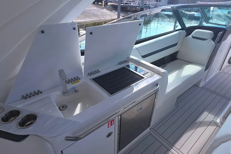 Slide: The Image of 2026 Formula 360 Crossover Bowrider I/O with sleek interior and modern amenities. - 17