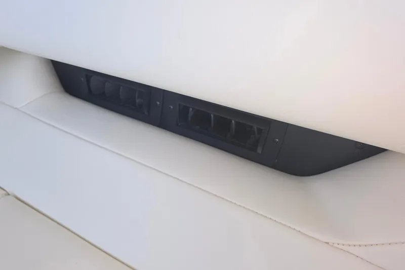 Slide: The Image of 2026 Formula 360 Crossover Bowrider I/O interior detail with sleek white seating. - 20