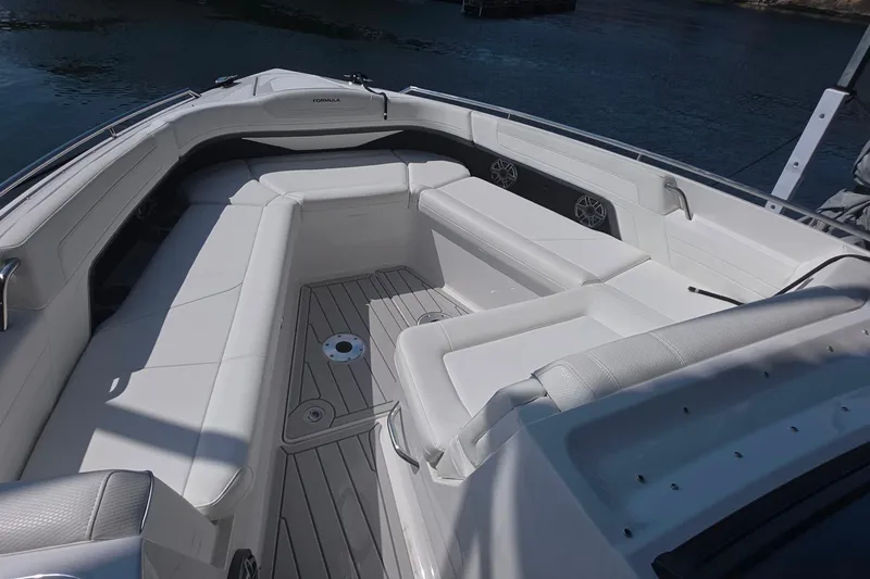 Slide: The Image of 2026 Formula 360 Crossover Bowrider I/O with spacious white seating and sleek design. - 27