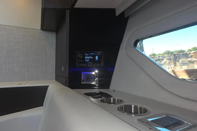 Slide: The Image of Interior of 2026 Formula 360 Crossover Bowrider I/O with modern audio system and window view. - 39