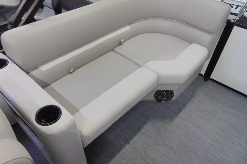 Slide: The Image of Luxurious seating on the 2026 Godfrey EX 2086 CX boat with integrated cup holders. - 12