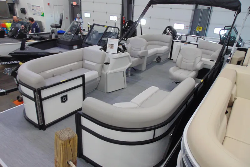 Slide: The Image of 2026 Godfrey EX 2086 CX pontoon boat with spacious seating and modern design. - 3