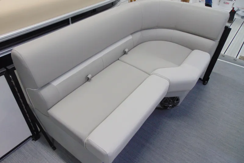 Slide: The Image of Luxurious seating on 2026 Godfrey EX 2086 CX boat, featuring plush, light gray upholstery. - 6